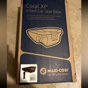 New in box. Maxi cosi car seat base.